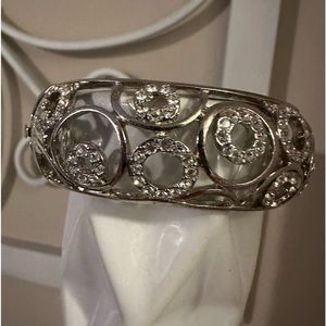 Women’s silver and rhinestone fancy bangle bracelet